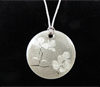 Link to dogwood necklace by Everyday Artifact